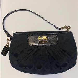 Black and gold coach wristlet